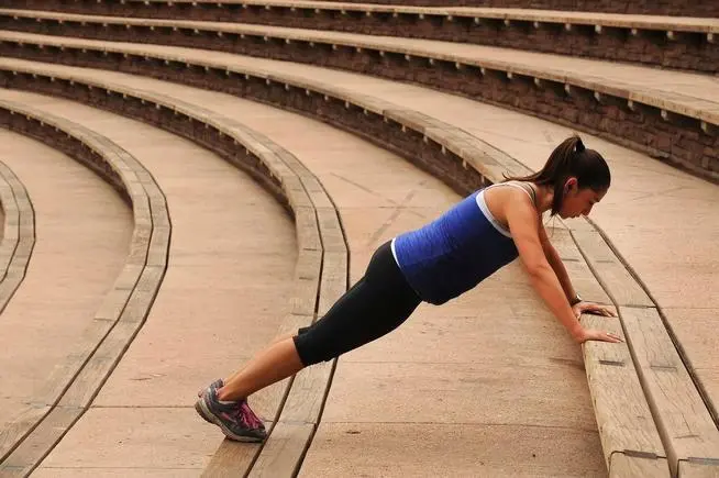 Athletes organizing bars during training sequence